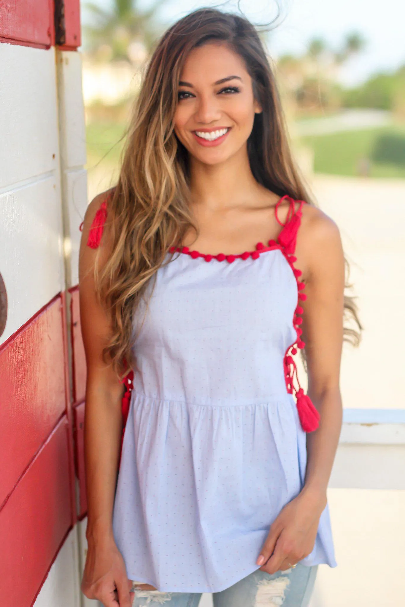 Light Blue Top with Tassel and Pom Pom Details