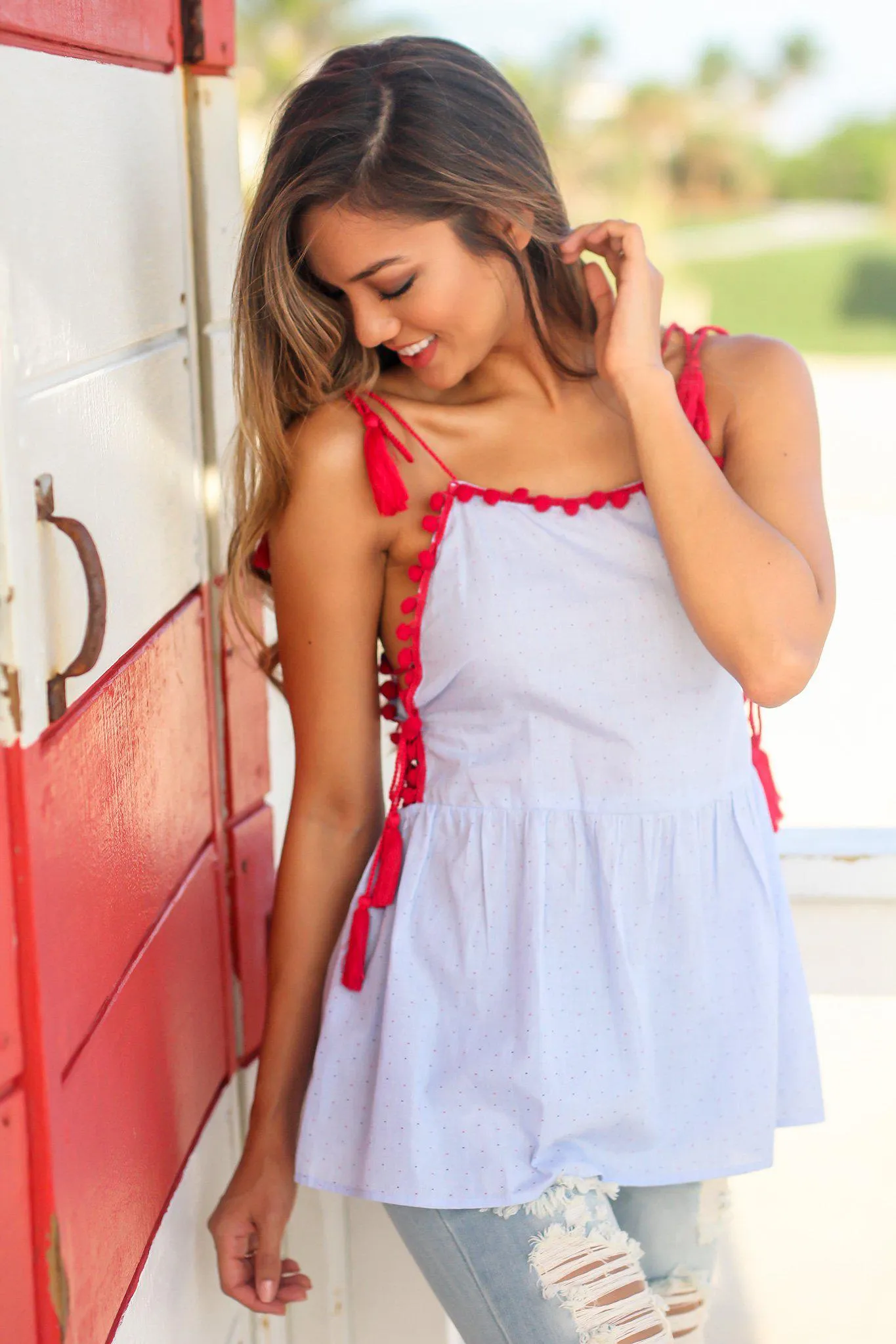 Light Blue Top with Tassel and Pom Pom Details