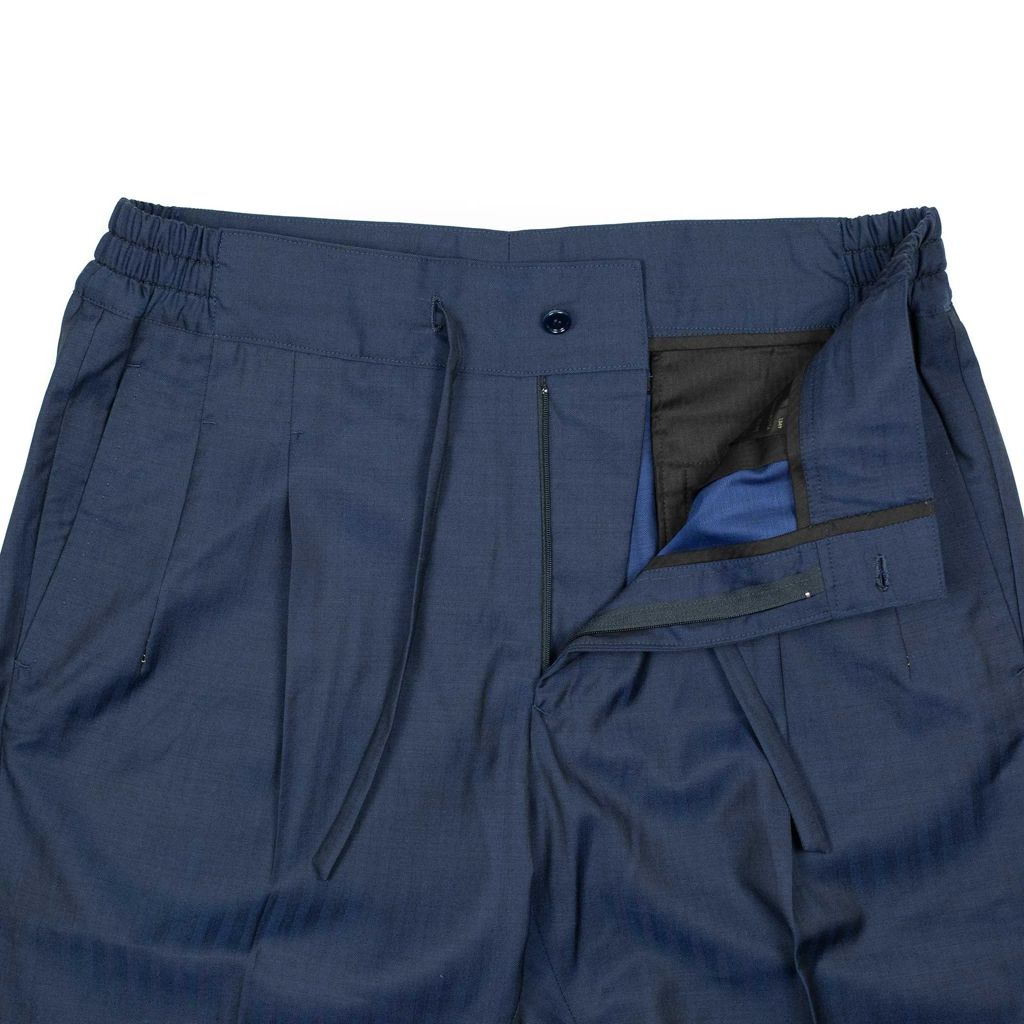 Pleated Lounge trousers in navy herringbone wool Solaro