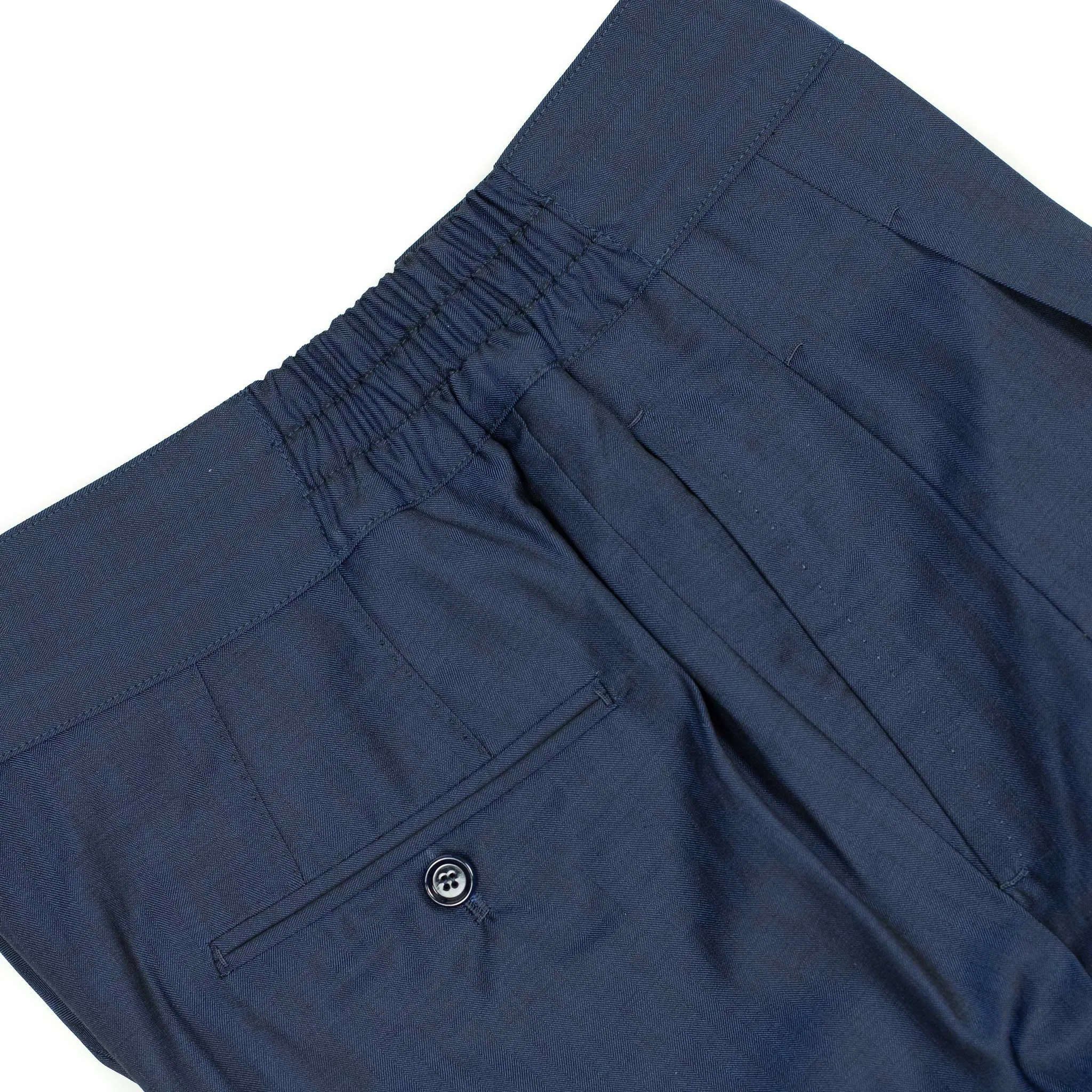 Pleated Lounge trousers in navy herringbone wool Solaro