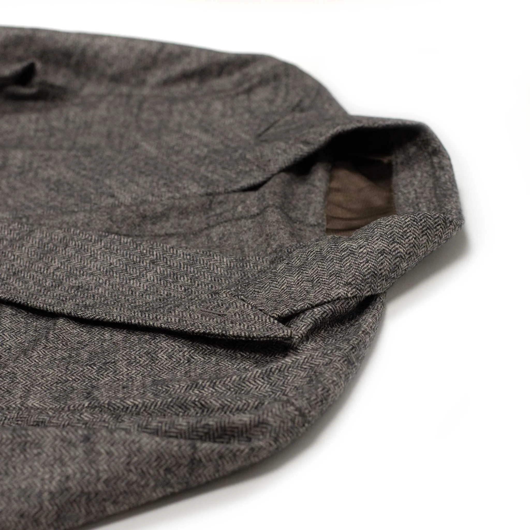 Unstructured double-breasted jacket in dark brown and taupe wool herringbone